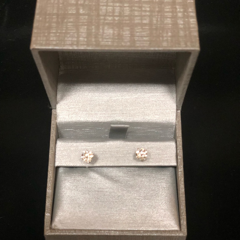1 ct 14k white gold round cut solitaire earrings.